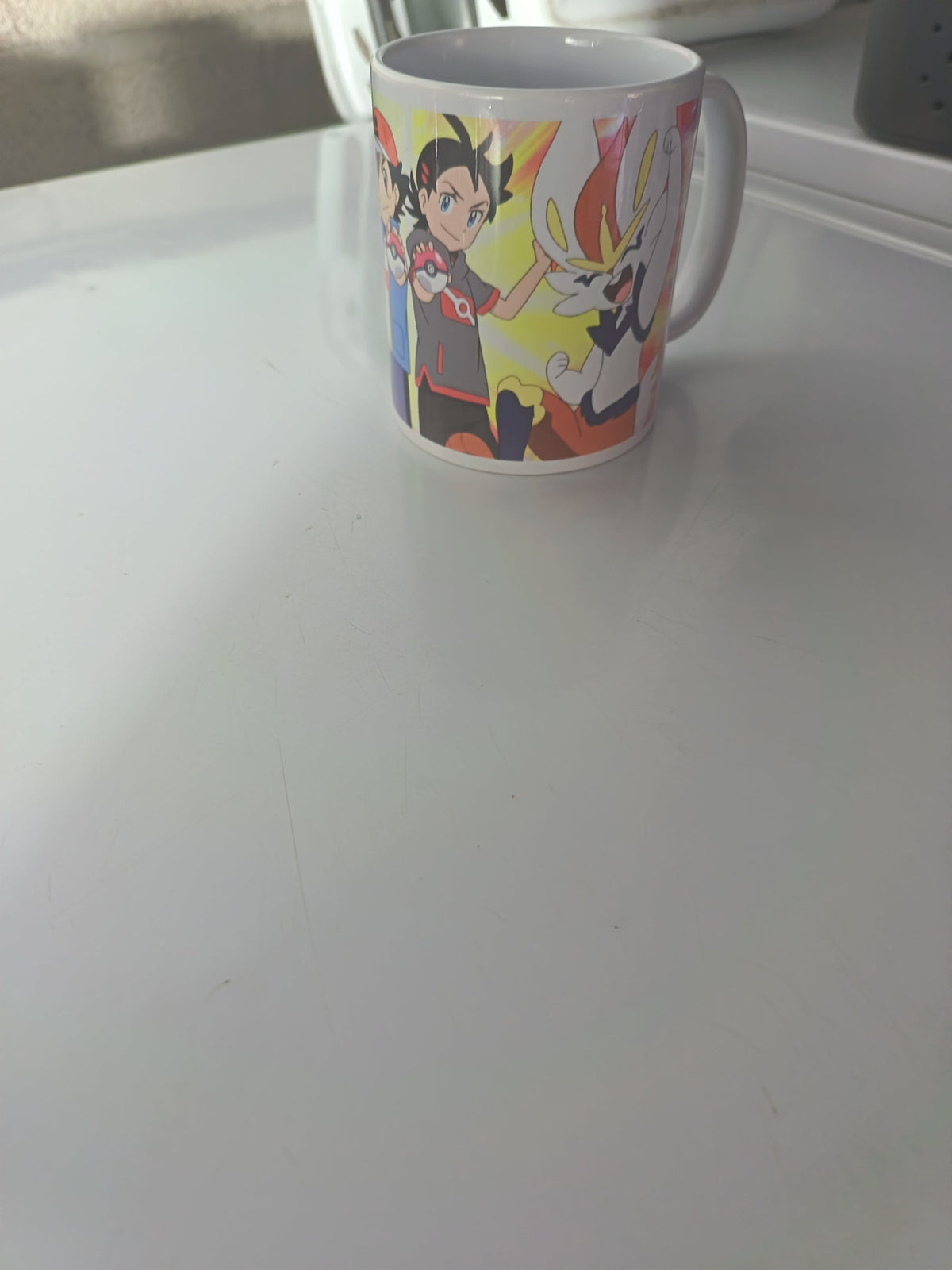 Tasse céramique Pokémon Léon et Shifours combat flammes
