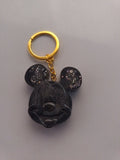 Porte-clé Mickey en résine noire marbrée à grosses paillettes argentées avec anneau doré